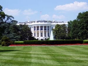 An image of the White House with trees along its side to represent the federal employment