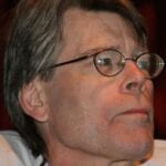 A Photo Of Stephen King Wearing Eyeglasses And Looking To His Left