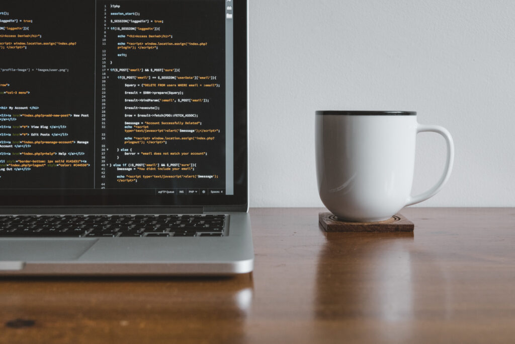 Coding With Coffee On A Desk