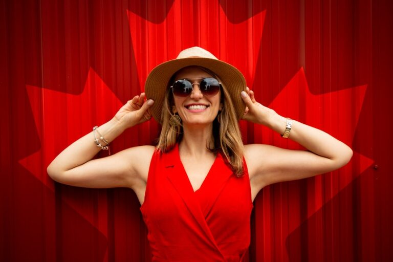 happy canadian woman granted a US work visa