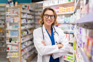 Happy-Smiling-Pharmacist-In-Drugstore