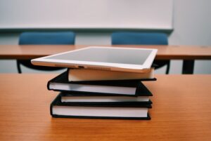 Tablet And Books Used In Research Intern Resume Examples