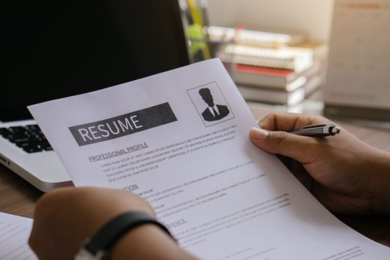 a hiring manager reading a resume