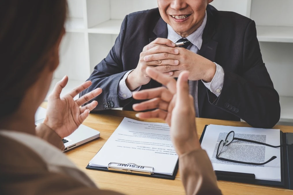 job applicant gestures answering interview questions
