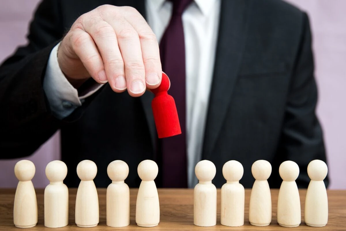 a human resources concept of removing dismissal firing or hiring of an employee or individual due to discrimination
