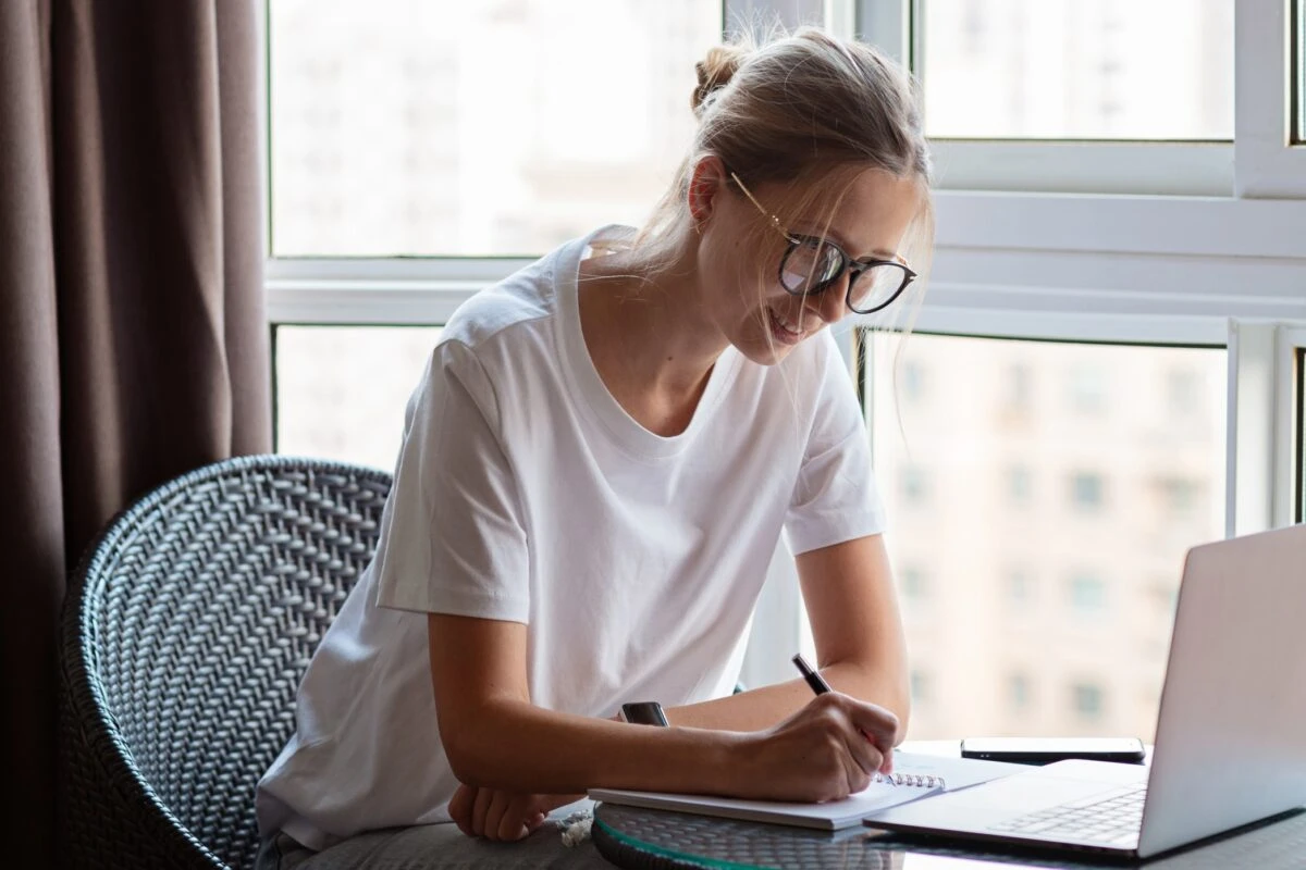 female working at home looking for free online certifications