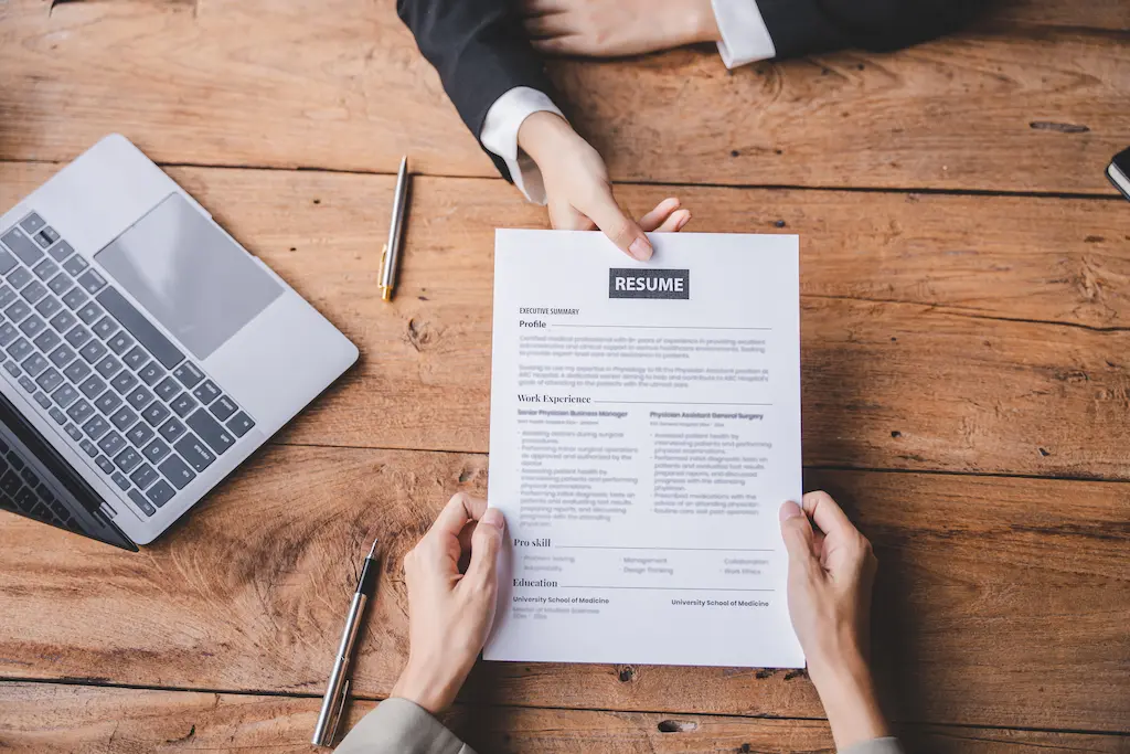 Job Applicant Presenting The Resume