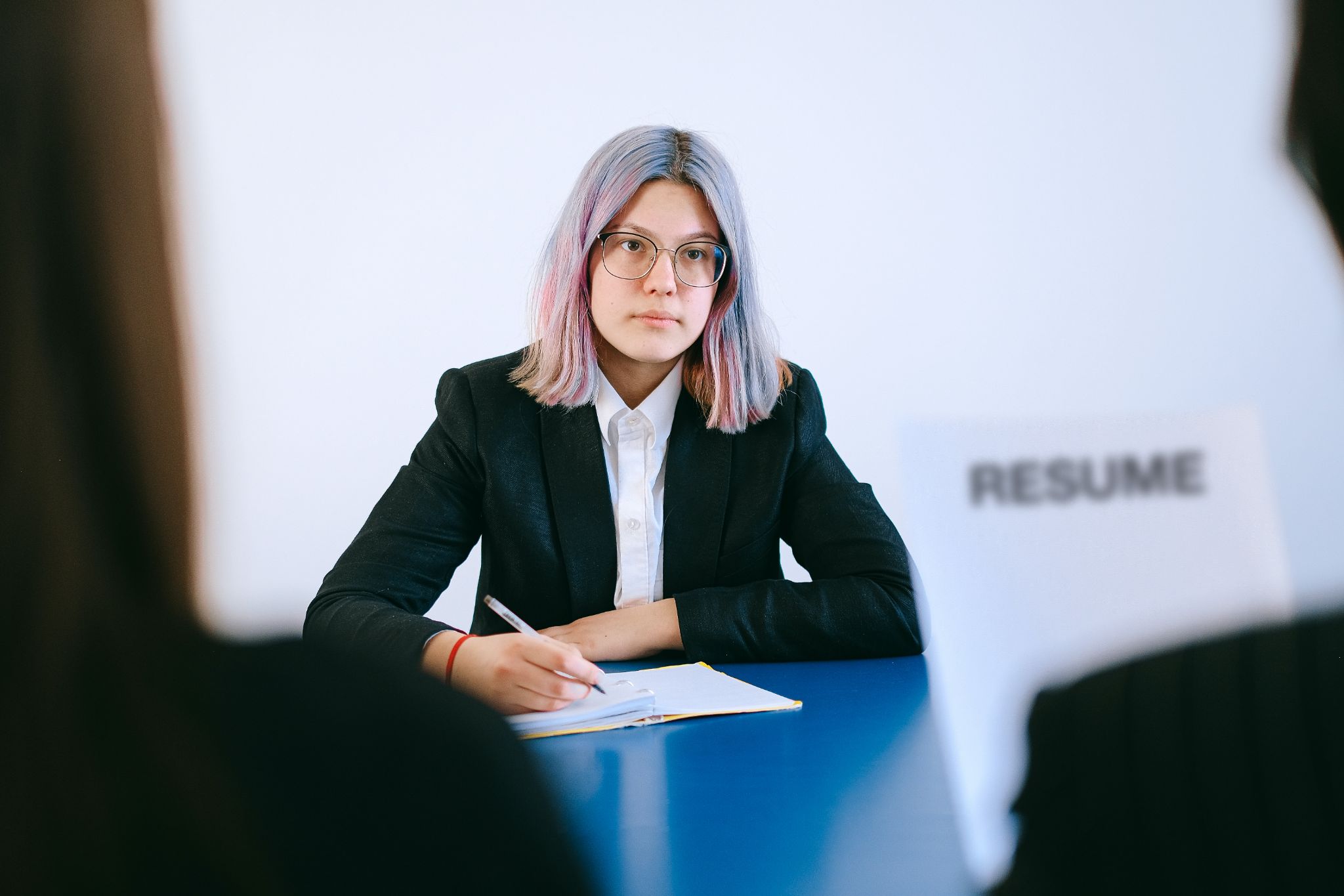 A Woman Interviewing Applicants