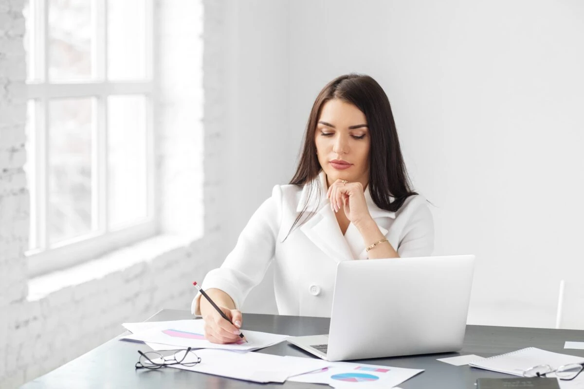 successful finance manager working laptop