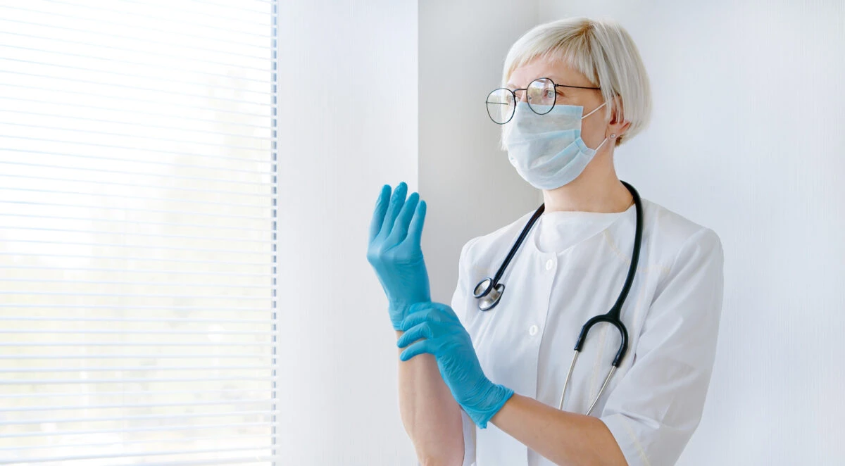 doctor wearing gloves face mask