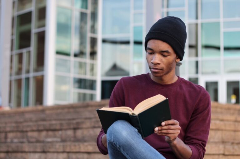 A man reading career advice for college students.