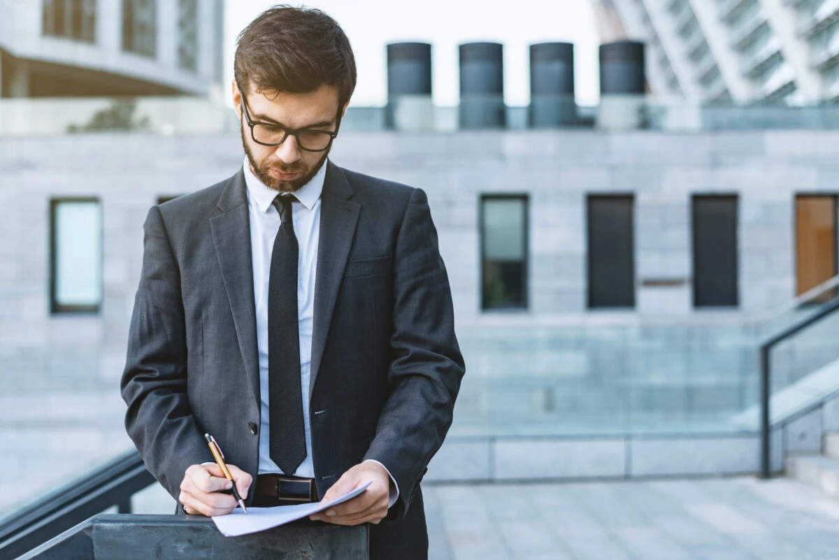 man holding specialized resume scaled