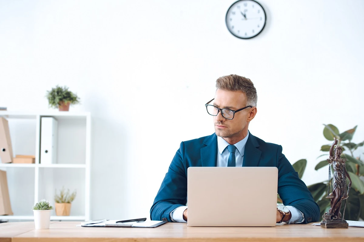lawyer thinking working laptop