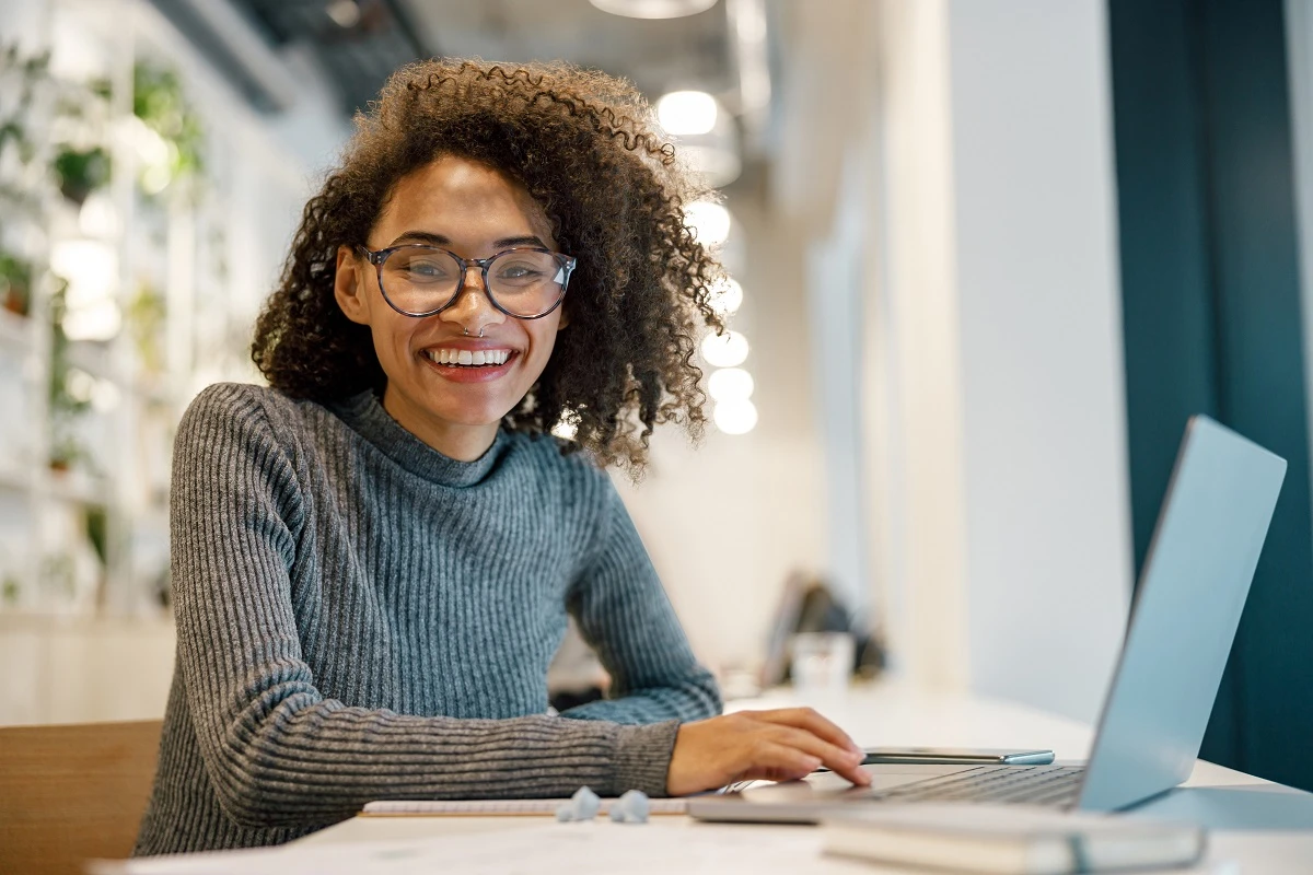 smiling woman create resume