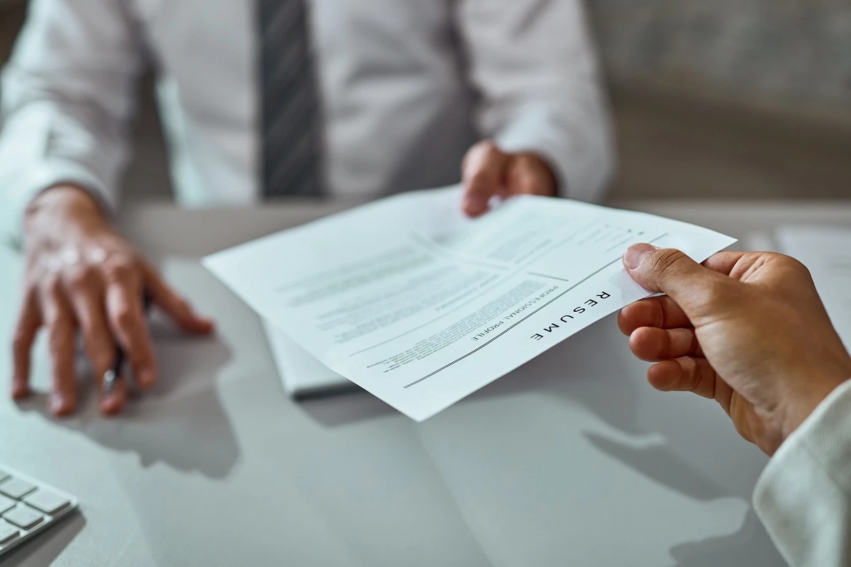 job applicant receiving a draft after realizing the answer to 'are resume writing services worth it