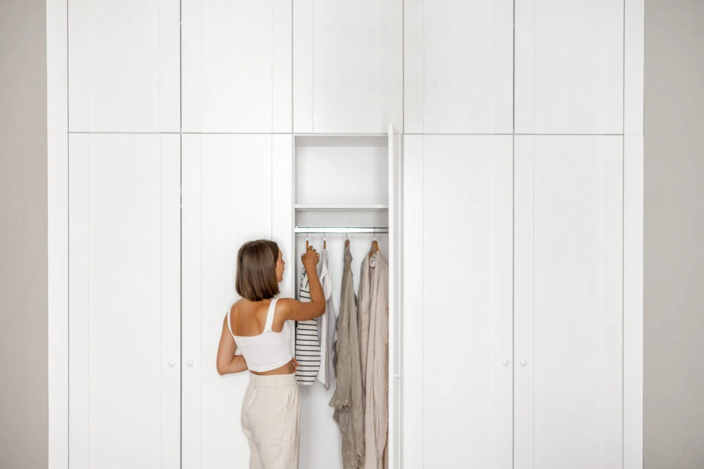 woman choosing what to wear for retail job interview