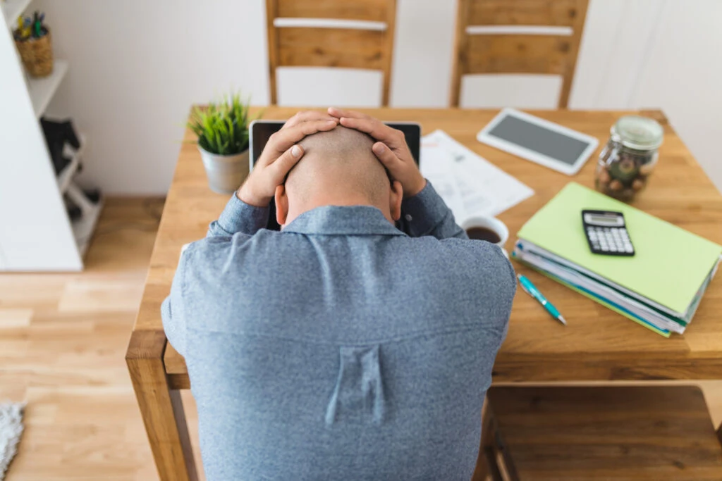 unhappy man seeking job inspite of hiring freeze