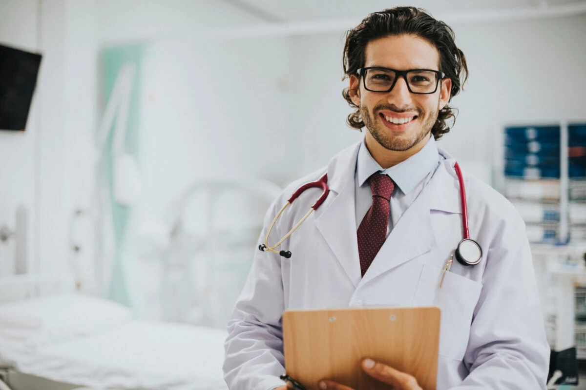 happy physician with a clipboard