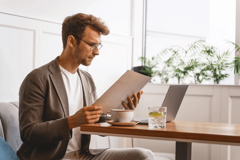 focused recruiter examining the skills section of a resume