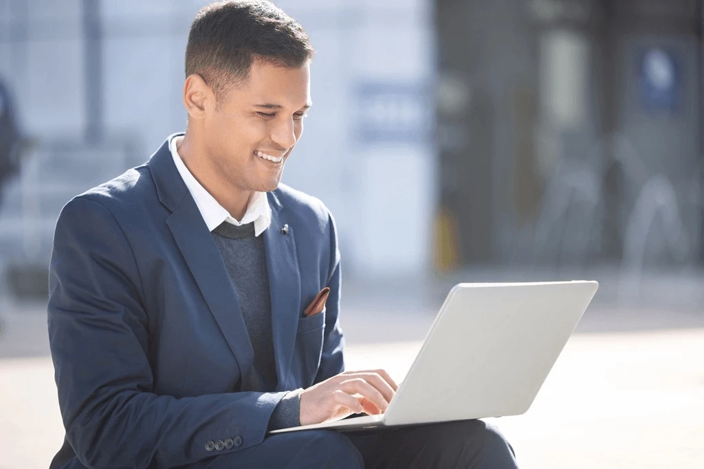 job applicant researching what is KSA in his laptop