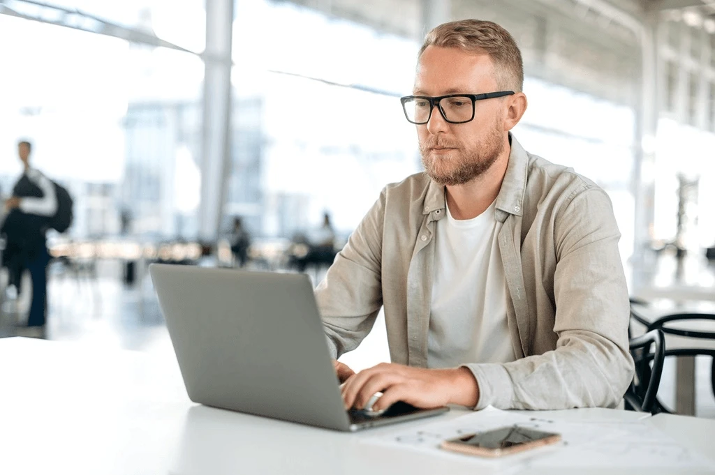 Job Seeker Writing His Human Resources Resume