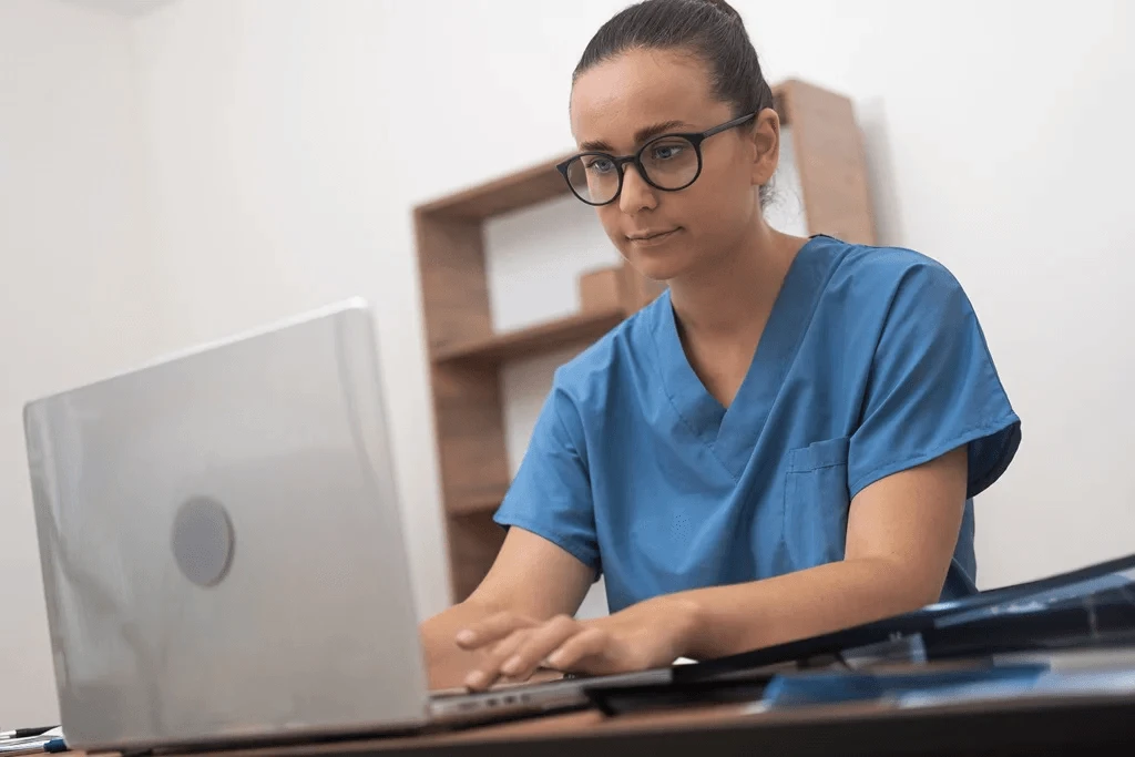 Medical Staff Working On Her Emergency Management Resume