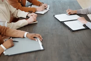 newly hired employee signing the contract