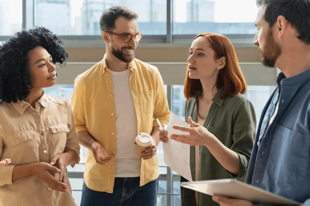 employee collaborating with her colleagues