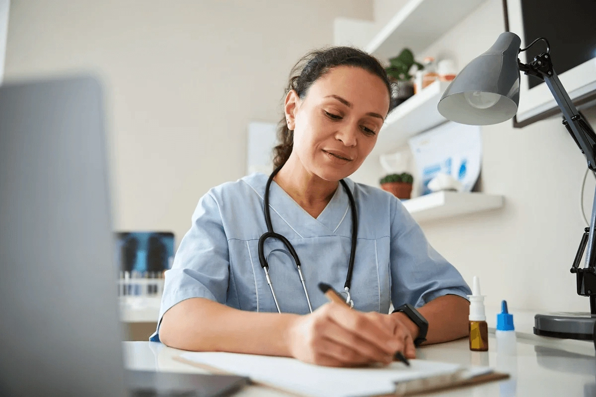 nurse writing her resume