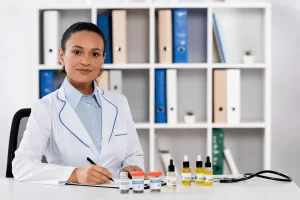 pharmacist surrounded by medicines at work