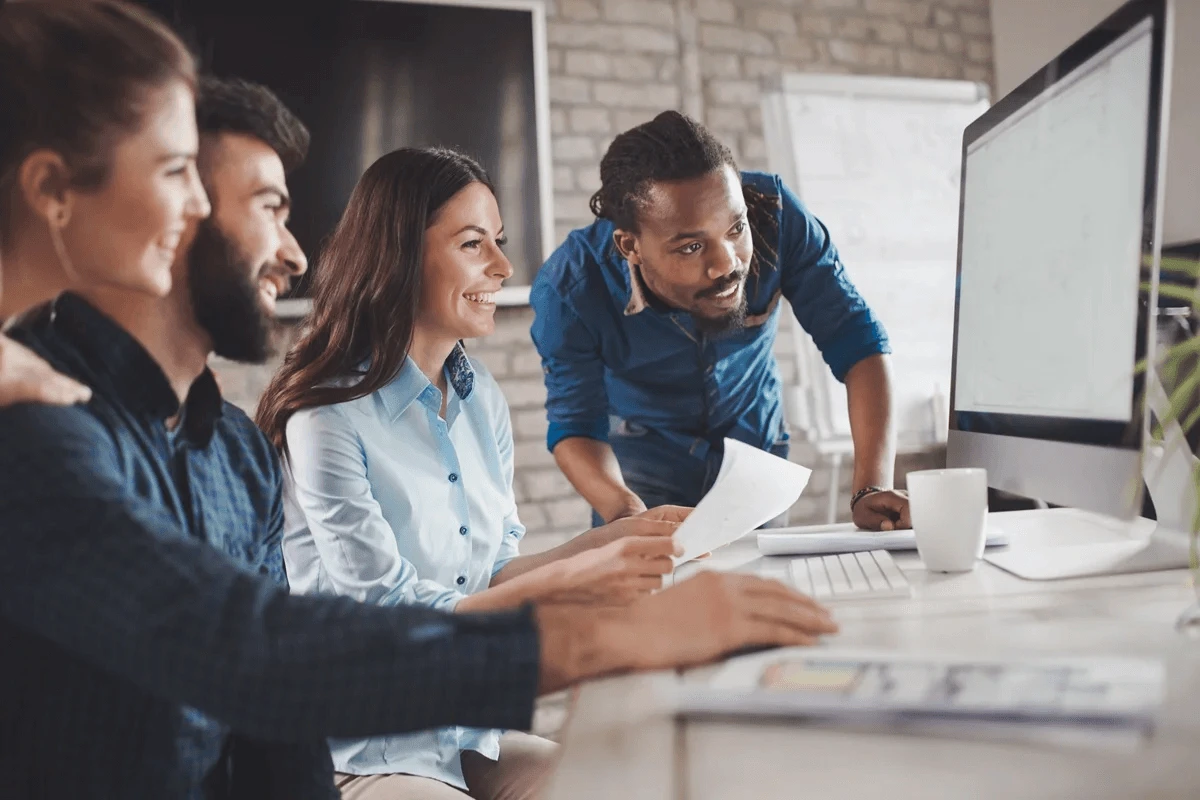 employees demonstrating soft skills in the workplace