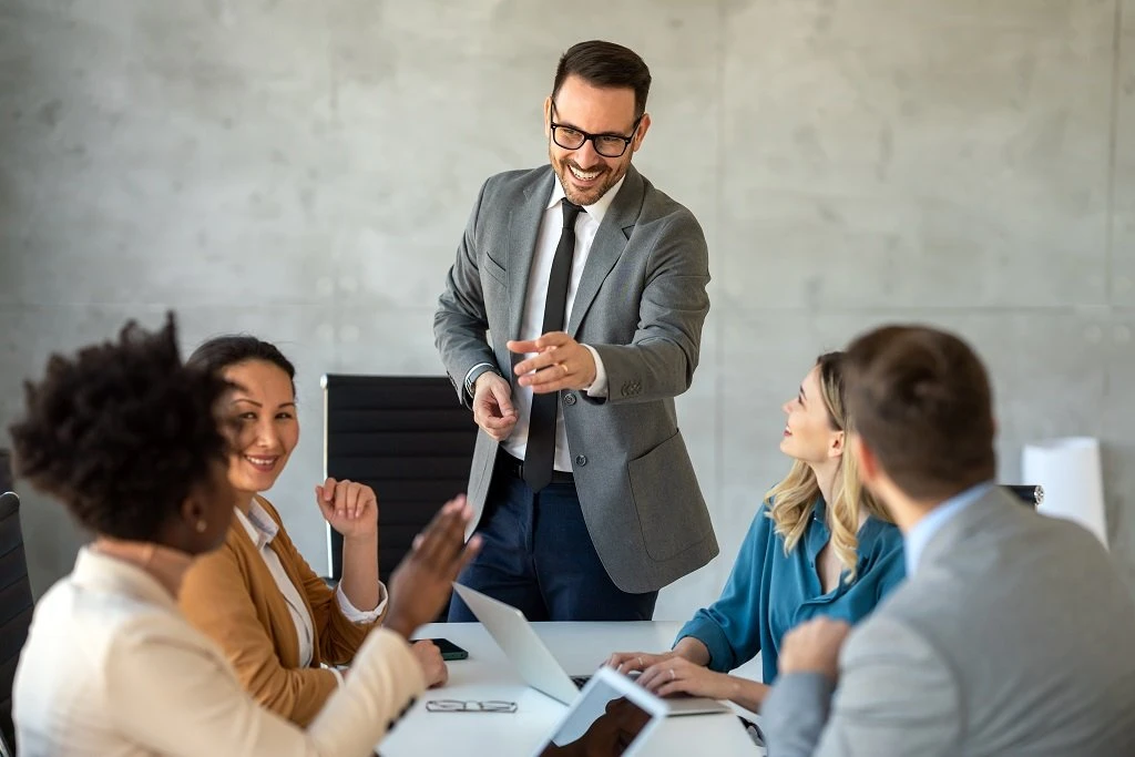Business Leader Fostering Teamwork And Leadership Roles