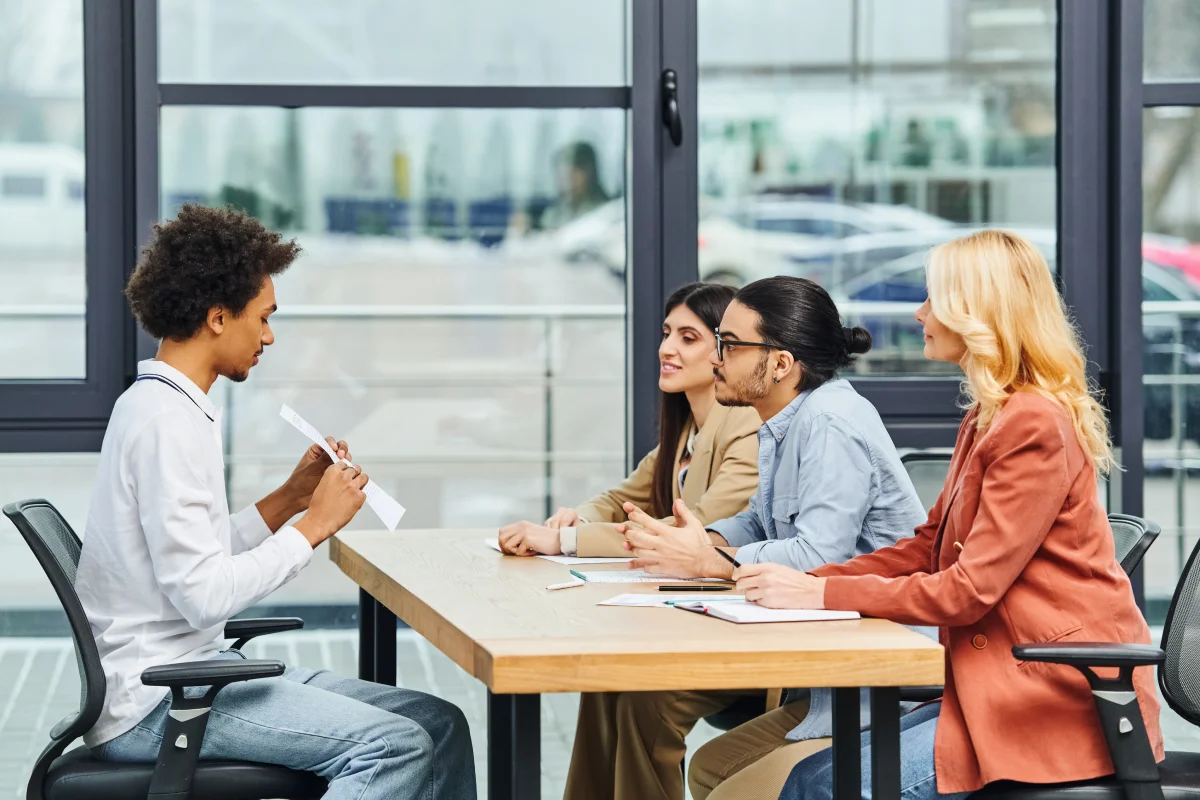 intense job interview with potential employees in a bustling office setting