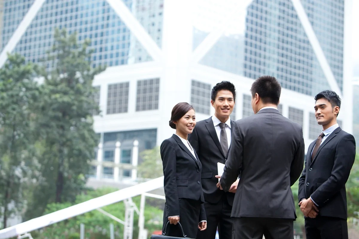 group of professionals in corporate attire