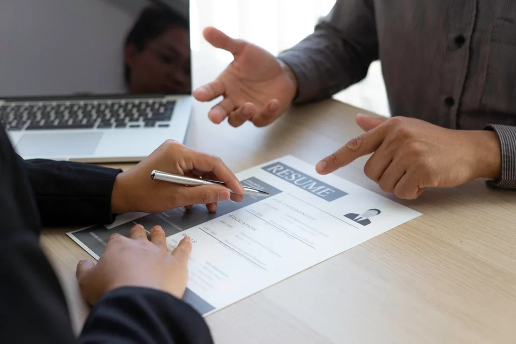 Client Pointing Out The Mistakes In A Resume Draft