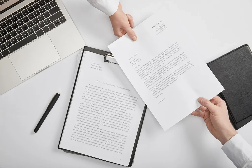 Job Applicant Submitting A Cover Letter To A Recruiter