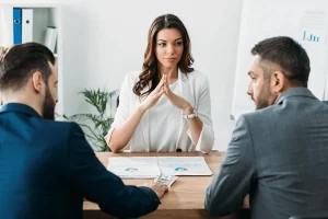 professional negotiating with businessmen