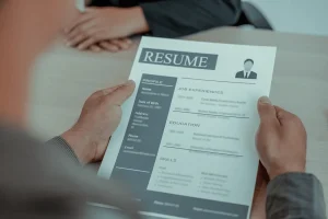 Recruiter Scanning The Skills On Resume