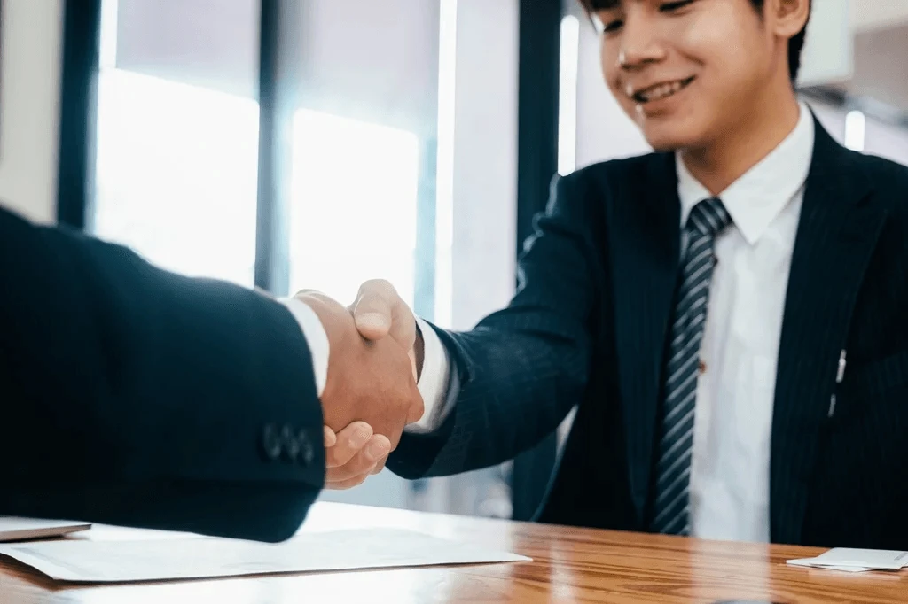 Recruiter Shaking The Hands Of An Applicant