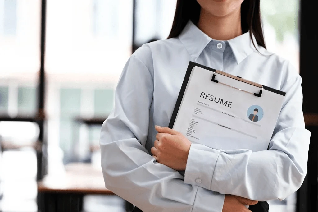 Student Holding A Resume