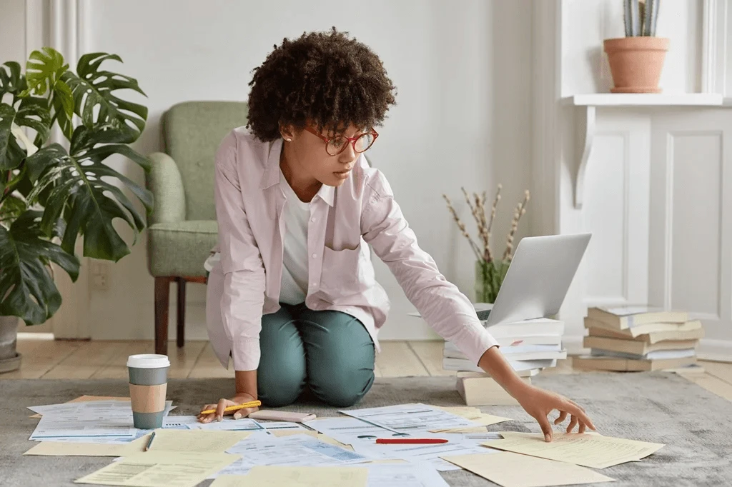 Job Seeker Checking All Her Job Documents For Career Roadmapping Purposes