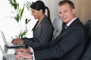 Man And Woman In Formal Attire Representing Professional Job Search Firms