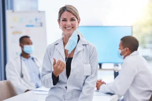 physician assistant working alongside other healthcare professionals