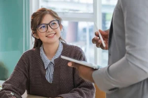young professionals getting hired after writing an effective resume for teens