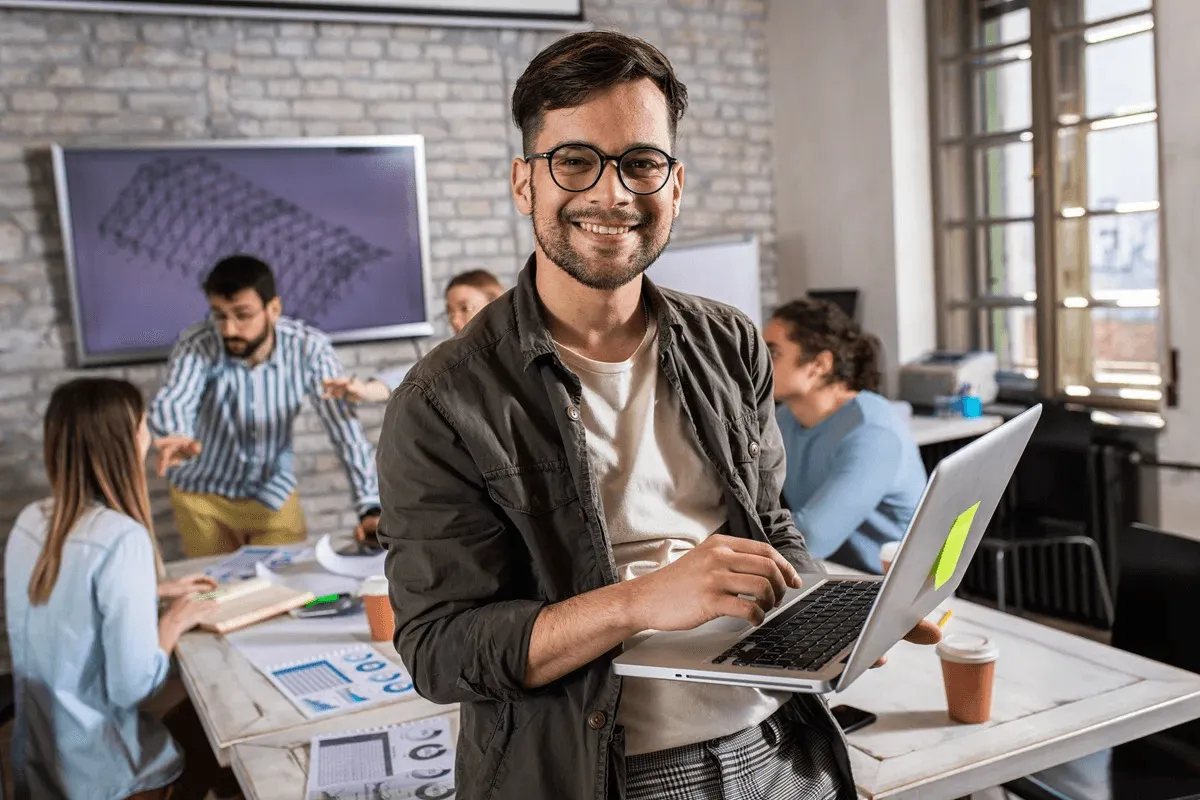 smiling employee confident with his digital marketing skills