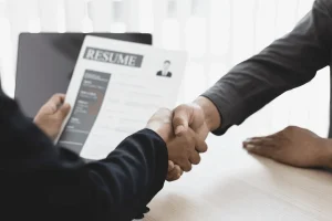 business development job applicant getting his resume evaluated