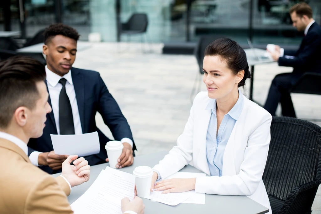 Applicant Showing Preparedness With Interview Questions To Ask Employer During Discussion With Two Interviewers