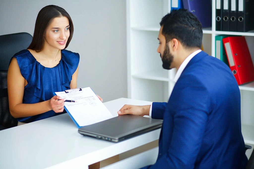 Candidate Discussing Interview Questions To Ask Employer During An Interview