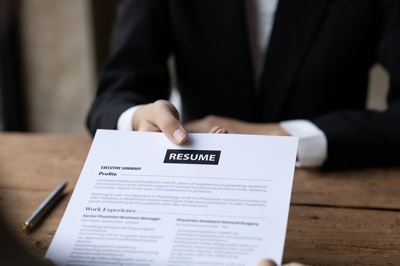 Image Showing A Recruiter Reviewing What Is A Resume To Evaluate A Candidate’s Skills And Experience