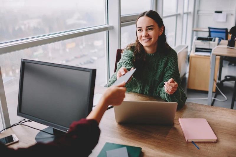 Job Seeker Explaining Experiences While Responding To Amazon Interview Questions During An Interview